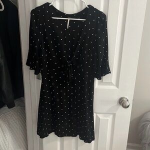 Free People Mini Polka Dot Dress, with a v neckline, size 4.